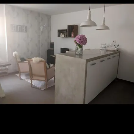 En Planta Baja De * Беранго